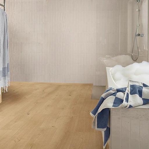 Bathroom featuring Pergo Namsen Bright Ardeche LVT, with light oak planks enhancing the airy feel.
