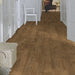 Traditional hallway with Pergo Namsen Natural Cabin LVT in classic oak tones.