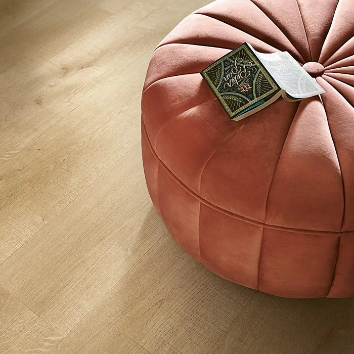 Close-up: Detailed view of Pergo Namsen Soft Ardeche LVT showing its fine wood grain texture and subtle, neutral oak finish.