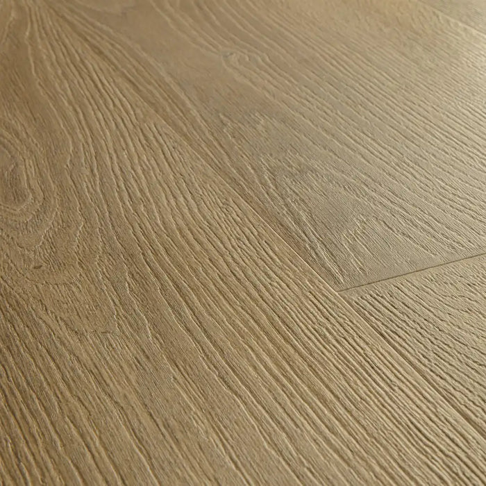 Zoomed-in view of Pergo Odense Beaufort laminate floor, highlighting the subtle beige grain pattern, matte finish, and beveled edges.