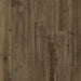 Detailed view of Pergo Odense Rustic Smoke showing the realistic wood texture, matte finish, and 4-way bevel edge in deep brown tones.