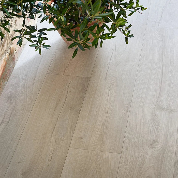 Pergo Visby Urban Grey laminate flooring in a modern living space with sleek, cool-toned grey planks and a clean, urban aesthetic.