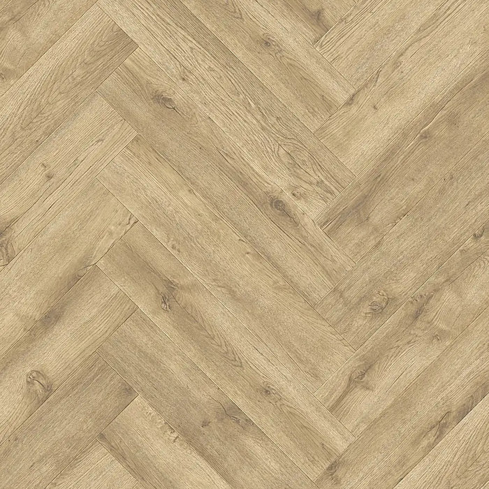 Close-up of Beige Century herringbone LVT plank highlighting soft beige wood grain.