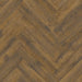 Detail of Dark Century herringbone LVT plank showing dark wood effect and bevelled edges.