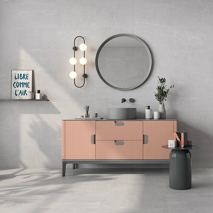 Bathroom wall finished with Persa Gris 33.3x55 wall tiles, creating a clean and contemporary look.