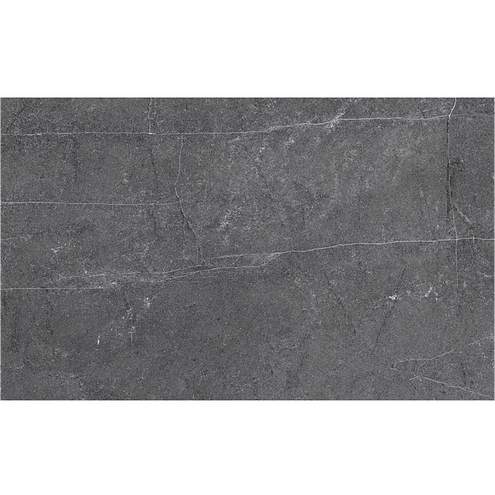 Detail of Persa Marengo 33.3x55 wall tile showing its smooth deep grey surface.