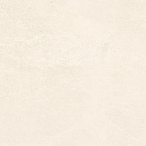 Close-up of Persa Marfil porcelain tile showing its fine texture and soft beige colouring.