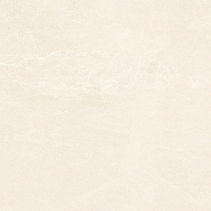 Close-up of Persa Marfil porcelain tile showing its fine texture and soft beige colouring.