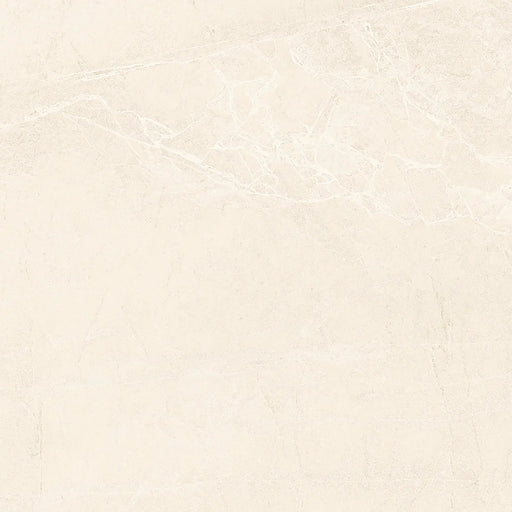 Close-up of Persa Marfil porcelain tile showing its fine texture and soft beige colouring.