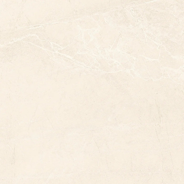 Close-up of Persa Marfil porcelain tile showing its fine texture and soft beige colouring.