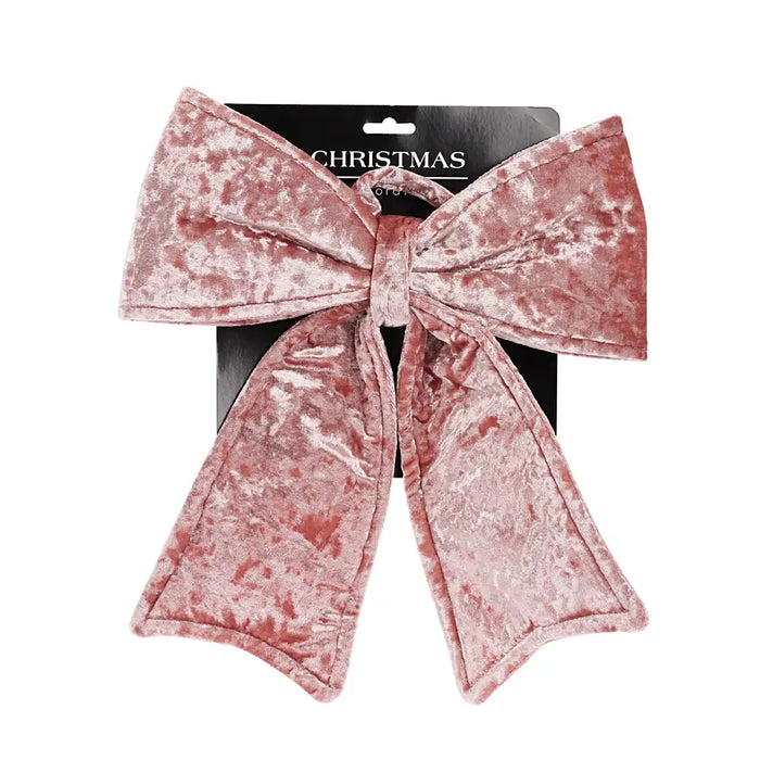 Close-up of Pink Velvet Bow showing rich velvet texture and neatly tied shape.