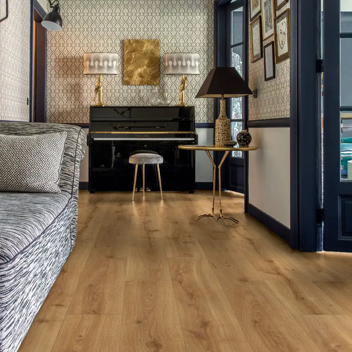Room view of Desert Oak Warm Natural flooring featuring wide, long planks in warm oak tones, creating a cosy and elegant interior.