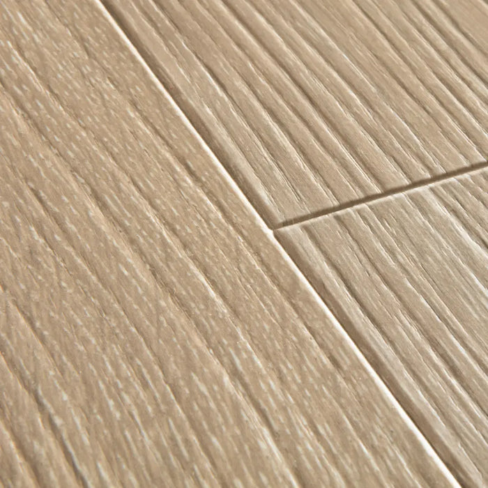 Close-up of Quick-Step Majestic Valley Oak Light Brown showing detailed natural oak texture and matte surface finish.