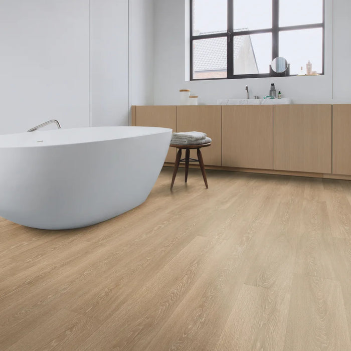 Room view featuring Quick-Step Majestic Valley Oak Light Brown flooring with wide planks and a spacious, premium finish.