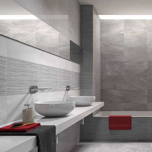 Bathroom interior featuring RLV Fred Gris wall tiles as a feature wall, enhancing the modern design.