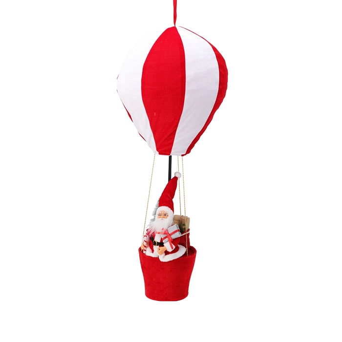 Close-up of red and white striped balloon ornament with Santa figure hanging below.
