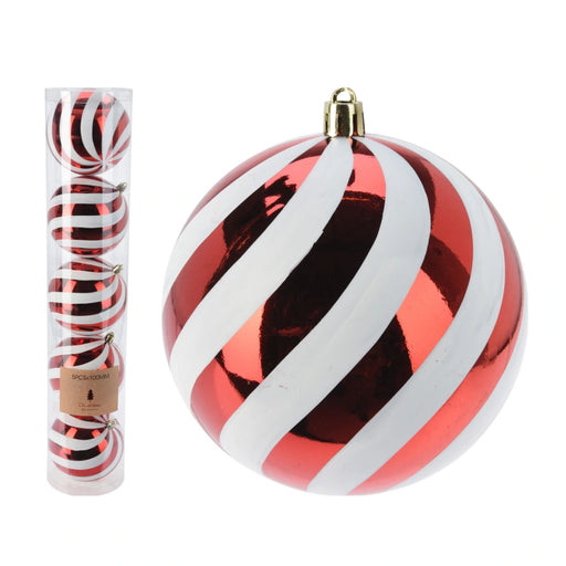 Close-up of red and white striped Christmas bauble showing glossy finish and candy cane pattern.