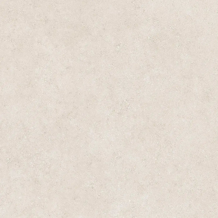 Detailed view of Reggio Marfil Porcelain tile surface, highlighting its smooth texture and natural beige veining.
