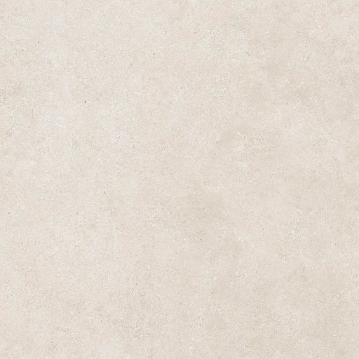 Detailed view of Reggio Marfil Porcelain tile surface, highlighting its smooth texture and natural beige veining.