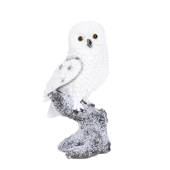 Close-up of Right Hand Owl On Tree Trunk Ornament showing feather detailing and textured tree trunk.