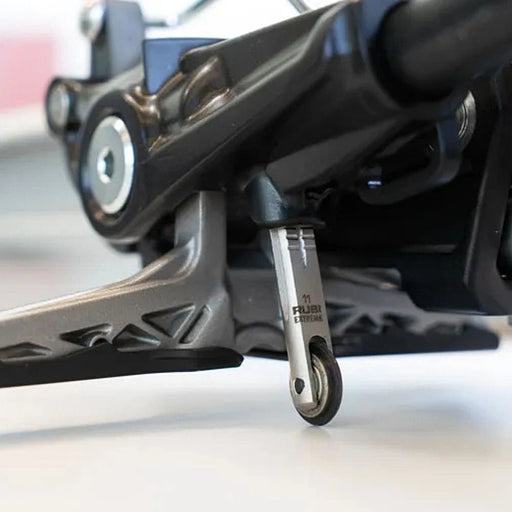 Rubi EXTREME roller installed on a manual tile cutter, ready for professional ceramic cutting.