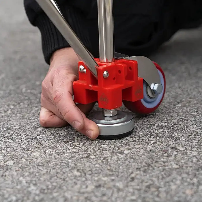 Close-up of Rubi Retrac-Table showing folded legs and threaded adjustable feet for use on uneven surfaces.