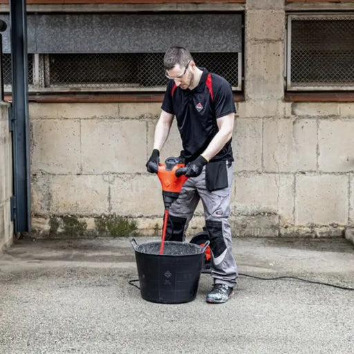Rubimix-9 Supertorque Electric Mixer with double handle, high-torque motor, and 140mm mixing head, ideal for cement adhesives, resins, and paints.