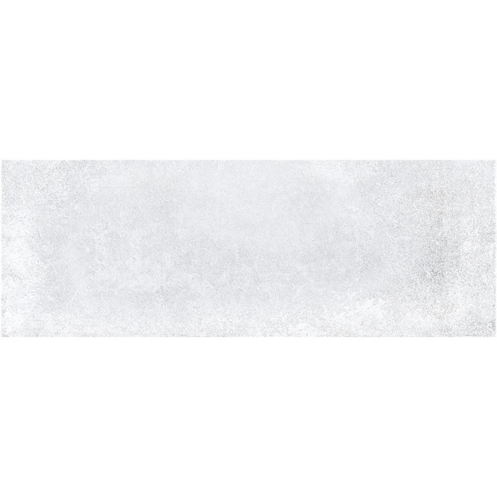 Close-up of Rue De Paris Blanco tile showing its natural finish and smooth white surface.