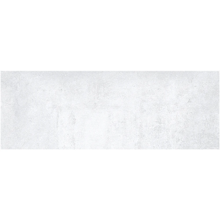 Close-up of Rue De Paris Blanco tile showing its natural finish and smooth white surface.