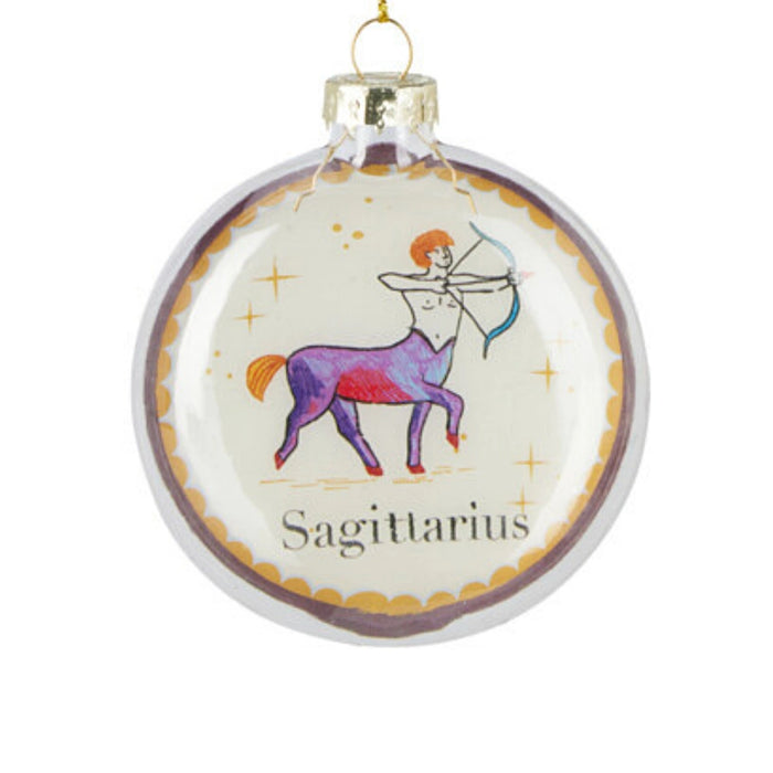 Close-up of Sagittarius Zodiac Christmas bauble showing zodiac design and shimmering surface