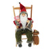 Close-up of Santa on Brown Rocking Chair showing detailed figure of Santa and textured rocking chair.
