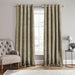 Scatter Box Caden Natural textured fully lined eyelet curtains hanging on a curtain pole in a neutral modern living space