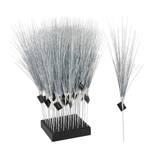 Close-up of silver iridescent spiral branch showing twisted shape and sparkling surface.