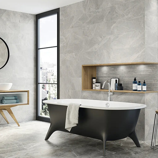 A bathroom wall finished with Silver Pearl Matt tiles, giving a soft grey, contemporary look.