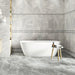 A bathroom wall finished with Silver Pearl Matt tiles, giving a soft grey, contemporary look.