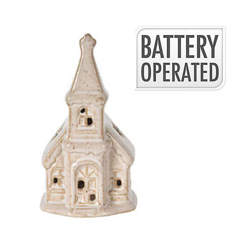 Close-up of Snowy Window Church showing snow-covered details.