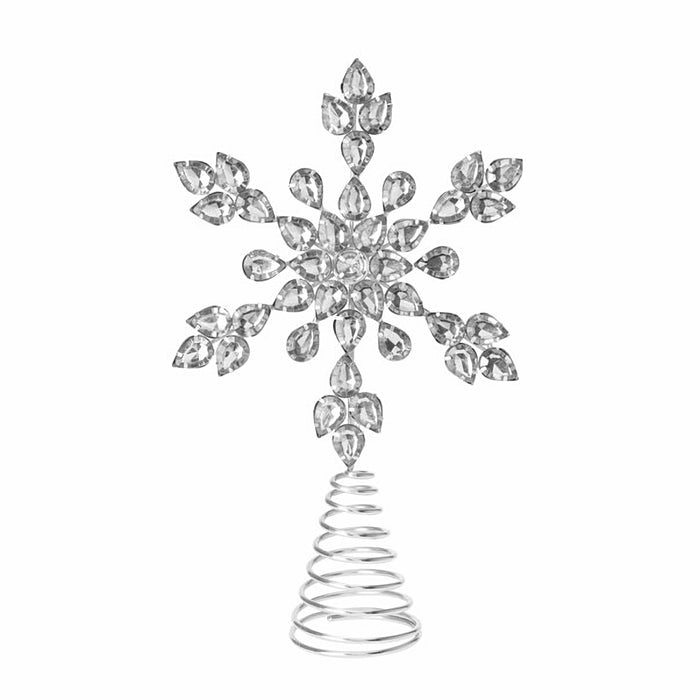 Close-up of silver star tree topper showing detailed rhinestone embellishments and metallic shine.