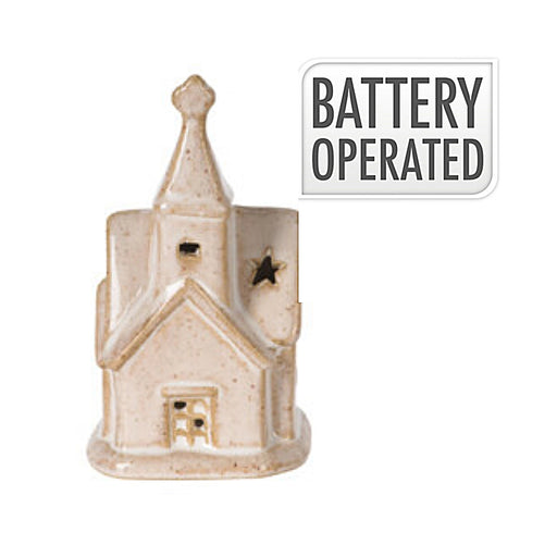 Close-up of Star Window Church showing star-shaped windows and warm LED lighting.