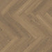 Close-up of the Honey Herringbone laminate plank with a matt finish, highlighting the fine oak grain and textured surface for a natural, untreated wood appearance.