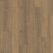 Close-up of Parador Studioline Honey laminate flooring showing its natural matt texture and warm honey tones with subtle wood grain detailing.