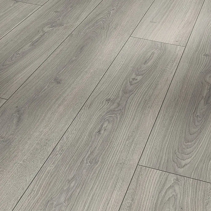 Close-up of Studioline Light Grey plank showing the natural matt texture and light grey oak finish, with subtle woodgrain detail for an authentic, raw timber look.