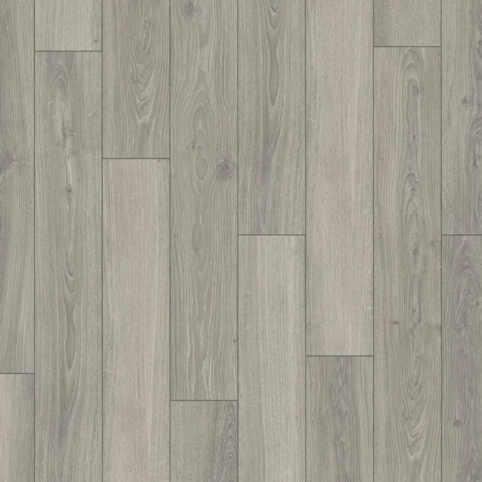 Close-up of Parador Studioline Light-Grey laminate flooring showing the natural matt wood texture and bevelled plank edge detail.
