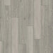 Close-up of Parador Studioline Light-Grey laminate flooring showing the natural matt wood texture and bevelled plank edge detail.