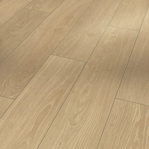 Close-up of Parador Studioline Natural laminate flooring showing authentic oak grain detail and matte texture with a subtle bevel.