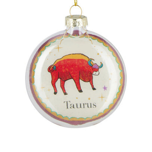 lose-up of Taurus Zodiac Christmas bauble showing detailed Taurus symbol and smooth finish.