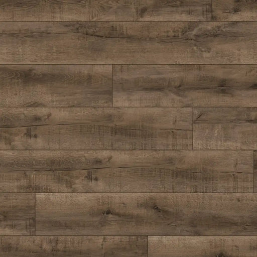 Close-up of Terra Oak flooring showing dark oak tones, subtle lighter shades, rustic texture, and bold dark knots.