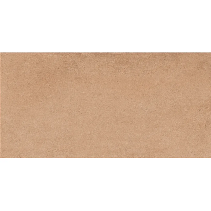 Close-up of Terracota Barro tile showing subtle clay-like texture and earthy terracotta finish.