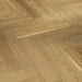 Detailed view of Trendtime 3 Oak Herringbone showing the matt lacquered finish, tight joints, and subtle bevels between strips.