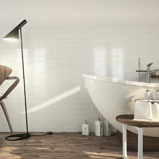 A kitchen wall styled with Vintage White wall tiles, giving a bright and rustic-inspired look.