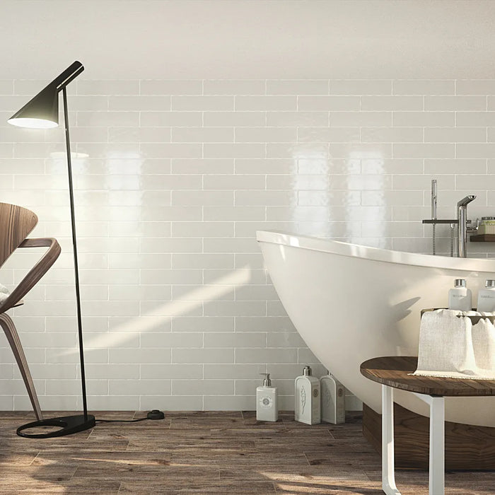 A kitchen wall styled with Vintage White wall tiles, giving a bright and rustic-inspired look.